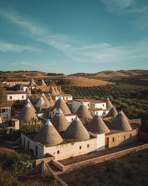Puglia - Whitewashed trulli and olive groves